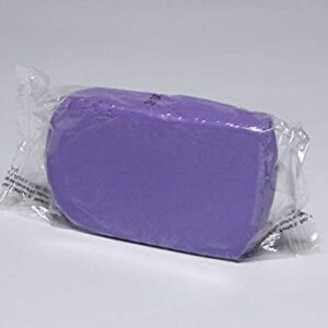 A purple soap sitting on top of a table.