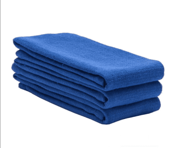 A stack of blue towels on top of each other.