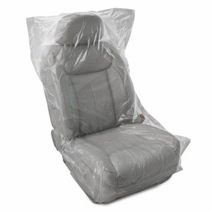 A seat cover sitting on top of a white chair.