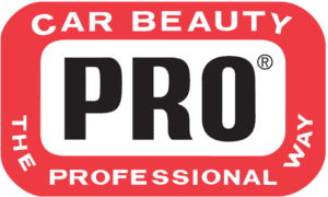 A red and white sign with the words " hair beauty professional pro ".